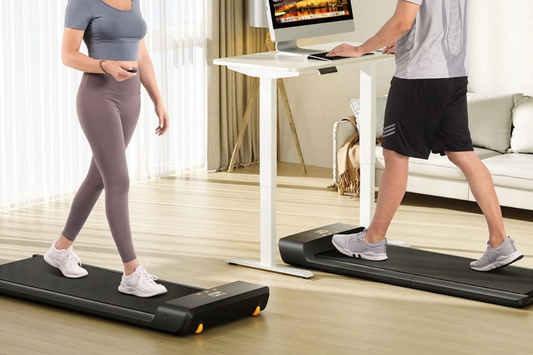 People working while using a walking pad and treadmill